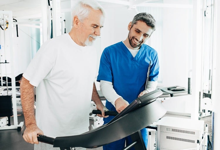 A senior in a supervised cardiac rehabilitation session
