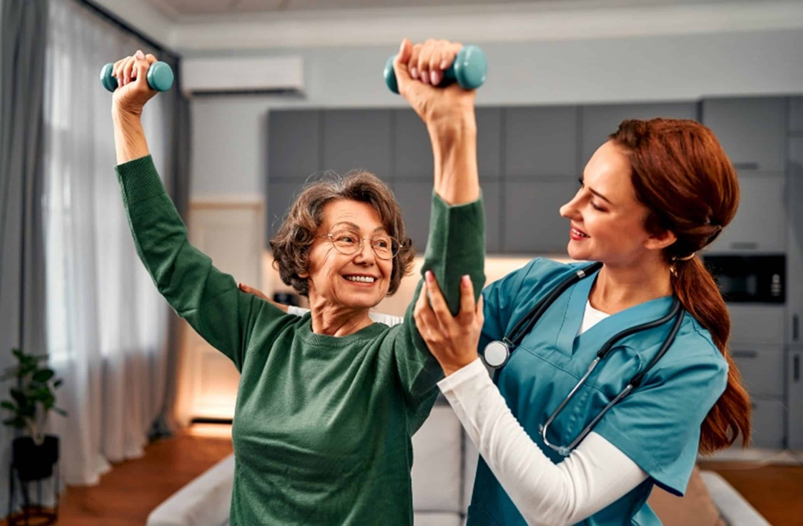 A physical therapist working with a senior patient