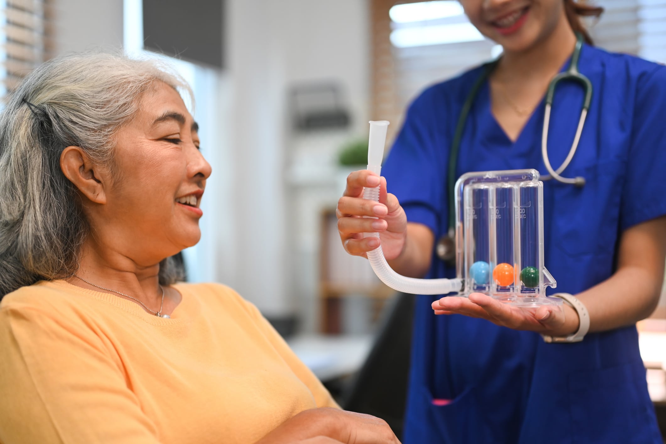 A senior building lung strength during pulmonary rehab