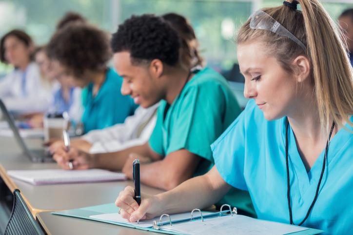 A group of skilled nurses taking notes at Alpine Skilled Nursing and Rehabilitation in Ruston, LA
