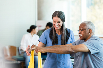 Patient in a physical therapy session with a professional caretaker in Ruston, LA